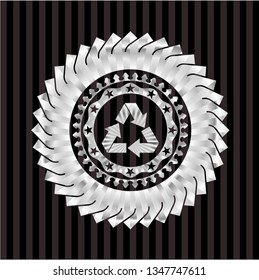 recycle icon inside silver emblem