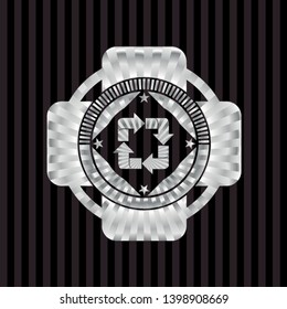recycle icon inside silver emblem