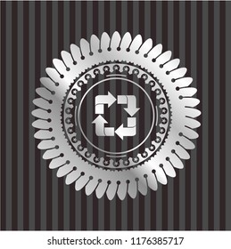 recycle icon inside silvery emblem