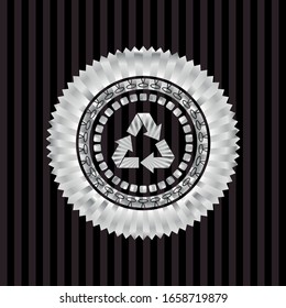 recycle icon inside silvery emblem