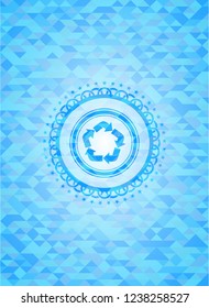 recycle icon inside sky blue mosaic emblem