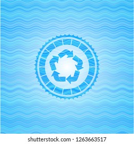 recycle icon inside sky blue water wave style badge.