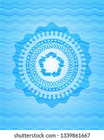 recycle icon inside sky blue water badge background.