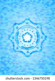 recycle icon inside sky blue emblem with triangle mosaic background