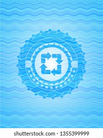 recycle icon inside sky blue water wave style emblem.