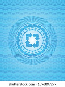 recycle icon inside sky blue water emblem.