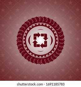 recycle icon inside vintage red emblem