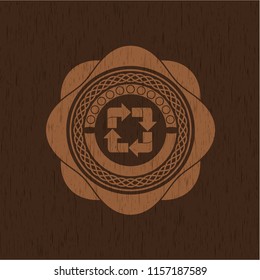 recycle icon inside vintage wood emblem