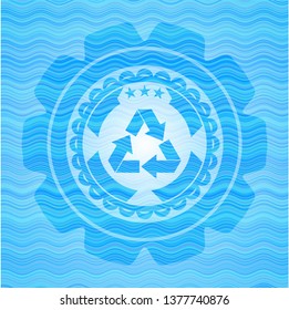 recycle icon inside water representation badge.