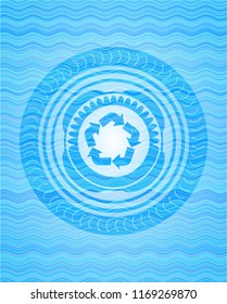 recycle icon inside water wave representation badge.