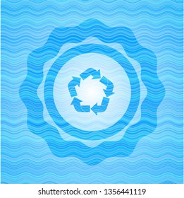 recycle icon inside water wave representation badge.