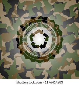 recycle icon on camo pattern