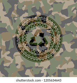 recycle icon on camouflaged texture