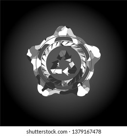 recycle icon on grey camo texture