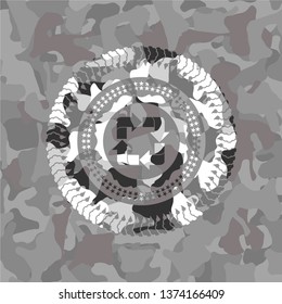 recycle icon on grey camouflage pattern