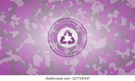 recycle icon on pink camo texture. 