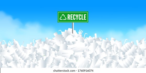 recycle sign on plastic waste pile ecology concept
