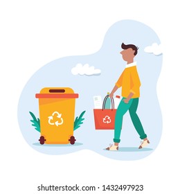 Recycling concept. Young man sorting garbage. Conscious eco living.