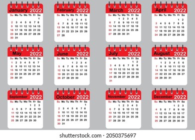 Red 2022 calendar. Page on spiral. Flat template. Planner diary. Realistic mockup. Vector illustration. Stock image.