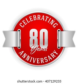 Red 80 years anniversary badge with silver border and ribbon