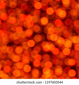 Red abstract festive backdrop with bokeh effect. New Year or Christmas decoration. Vector background.
