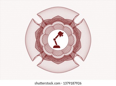 Red abstract linear rosette with desk lamp icon inside