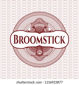 Red abstract linear rosette with text Broomstick inside