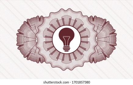 Red abstract rosette with light bulb icon inside