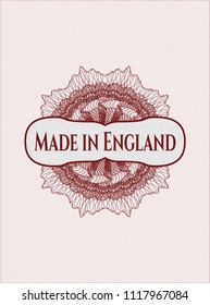 Red abstract rosette with text Made in England inside