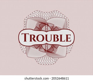 Red abstract rosette with text Trouble inside
