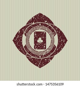 Red ace of clover icon inside distress grunge style stamp
