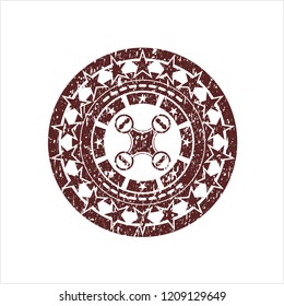 Red air drone icon inside rubber seal with grunge texture