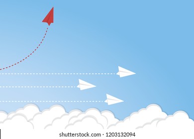 Red airplane changing direction and white ones. New idea, change, trend, courage, creative solution, innovation and unique way concept.