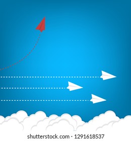 Red airplane changing direction and white ones. New idea, change, trend, courage, creative solution, innovation and unique way concept.