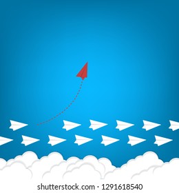 Red airplane changing direction and white ones. New idea, change, trend, courage, creative solution, innovation and unique way concept.