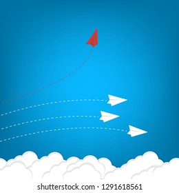 Red airplane changing direction and white ones. New idea, change, trend, courage, creative solution, innovation and unique way concept.