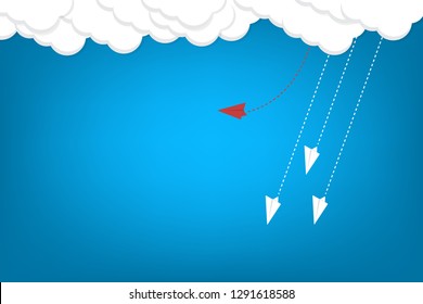 Red airplane changing direction and white ones. New idea, change, trend, courage, creative solution, innovation and unique way concept.