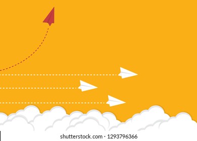 Red airplane changing direction and white ones. New idea, change, trend, courage, creative solution, innovation and unique way concept.