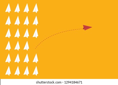 Red airplane changing direction and white ones. New idea, change, trend, courage, creative solution, innovation and unique way concept.