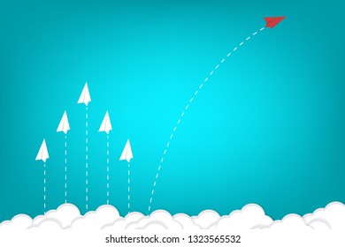 Red airplane changing direction and white ones. New idea, change, trend, courage, creative solution, innovation and unique way concept. 