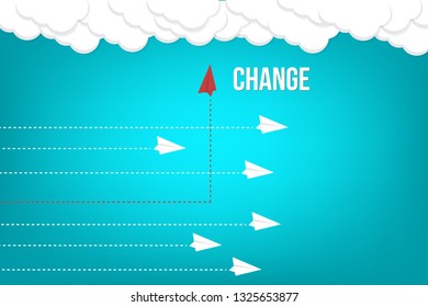 Red airplane changing direction and white ones. New idea, change, trend, courage, creative solution, innovation and unique way concept. 
