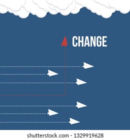 Red airplane changing direction and white ones. New idea, change, trend, courage, creative solution, innovation and unique way concept.