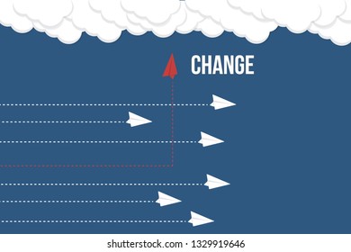 Red airplane changing direction and white ones. New idea, change, trend, courage, creative solution, innovation and unique way concept.