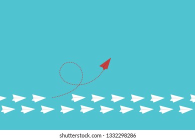 Red airplane changing direction and white ones. New idea, change, trend, courage, creative solution, innovation and unique way concept.