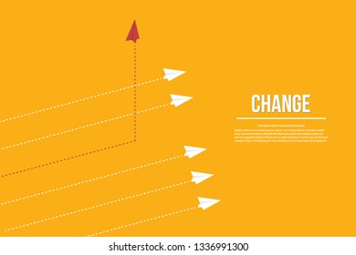 Red airplane changing direction and white ones. New idea, change, trend, courage, creative solution, innovation and unique way concept.