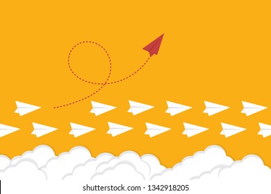 Red airplane changing direction and white ones. New idea, change, trend, courage, creative solution, innovation and unique way concept.