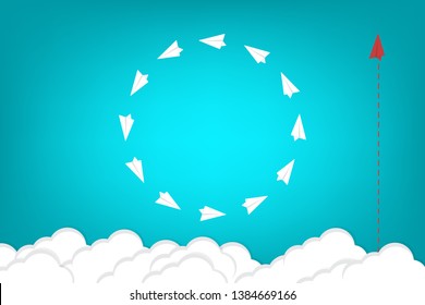 Red airplane changing direction and white ones. New idea, change, trend, courage, creative solution, innovation and unique way concept.