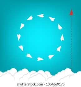 Red airplane changing direction and white ones. New idea, change, trend, courage, creative solution, innovation and unique way concept.
