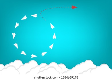 Red airplane changing direction and white ones. New idea, change, trend, courage, creative solution, innovation and unique way concept.