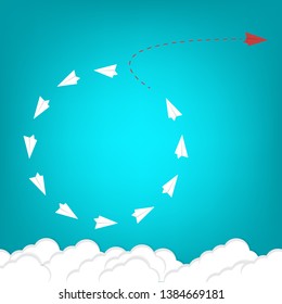 Red airplane changing direction and white ones. New idea, change, trend, courage, creative solution, innovation and unique way concept.